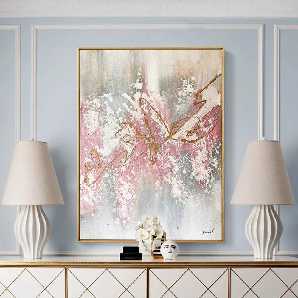 Room mockup showing pink and white blossoms on gold-coloured branches against a vertically streaked grey and cream background.