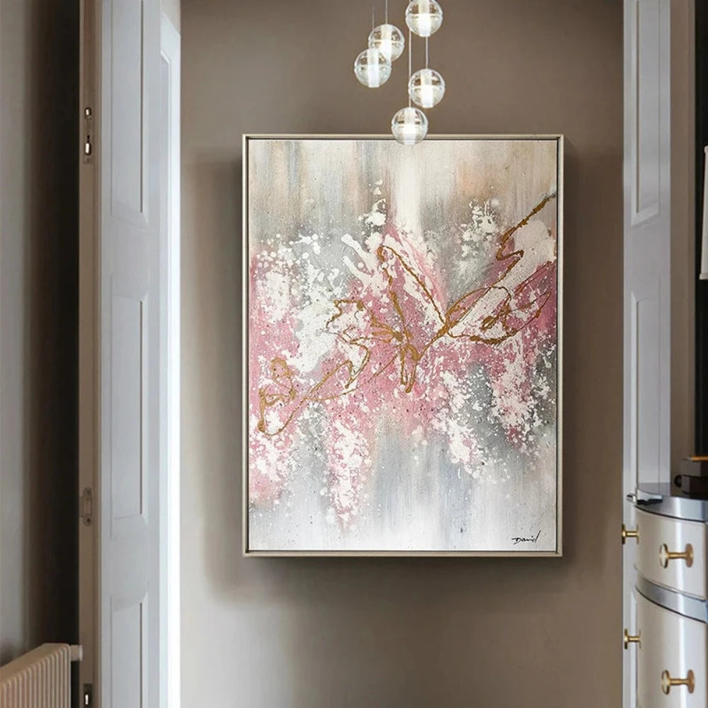 Room mockup showing pink and white blossoms on gold-coloured branches against a vertically streaked grey and cream background.