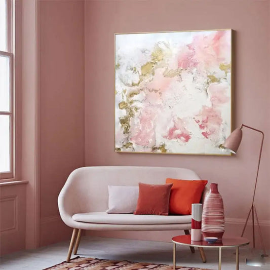 Room mockup showing soft pink and white textured patches interspersed with gold-coloured accents.