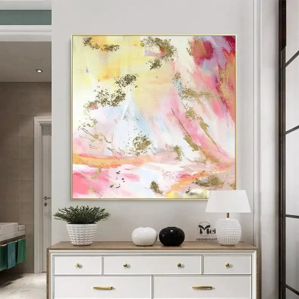Room mockup showing soft pink, pale yellow and white abstract washes with curved marks and scattered gold-coloured patches.