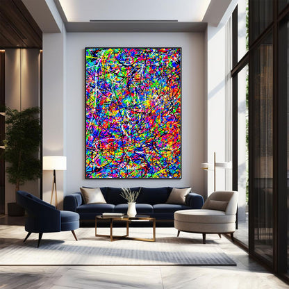 Vibrant multicolour abstract drip painting on canvas displayed in a modern living room interior