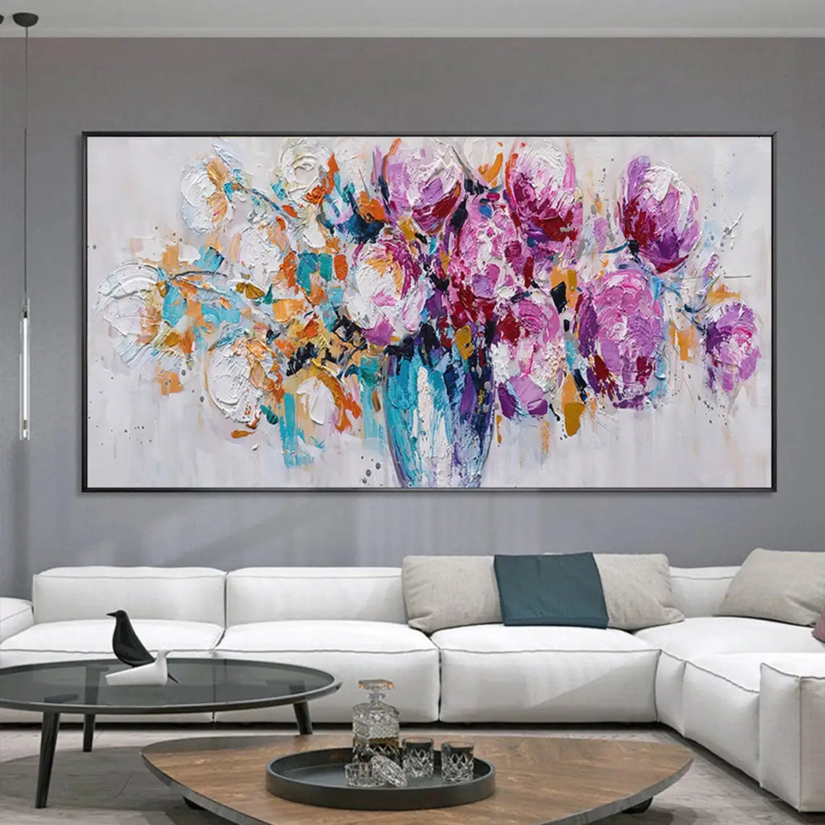 Room mockup showing expressive purple and magenta blossoms with orange sprigs and turquoise marks in a blue-toned vase against pale grey.