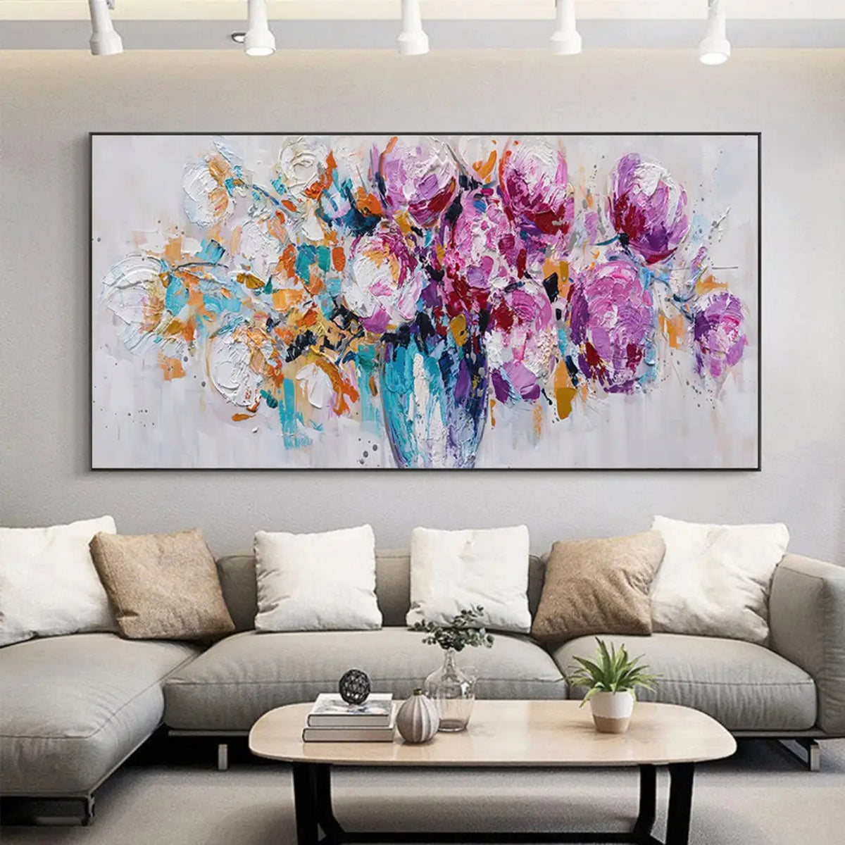 Room mockup showing expressive purple and magenta blossoms with orange sprigs and turquoise marks in a blue-toned vase against pale grey.