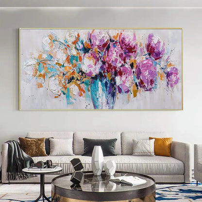 Room mockup showing expressive purple and magenta blossoms with orange sprigs and turquoise marks in a blue-toned vase against pale grey.