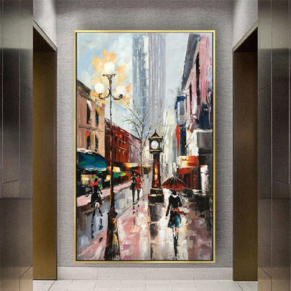 Room mockup. Rainy street with a tall clock, glowing streetlamp and umbrella-carrying figures among red buildings and grey reflections.
