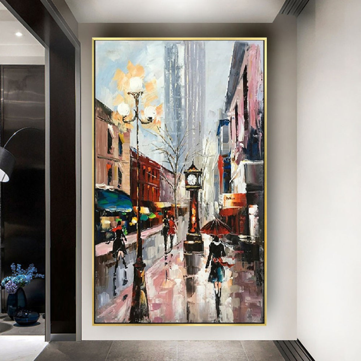 Room mockup. Rainy street with a tall clock, glowing streetlamp and umbrella-carrying figures among red buildings and grey reflections.