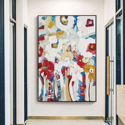 Room mockup. Loose red flower-like patches and blue and ochre stems rise through a heavily textured white background.