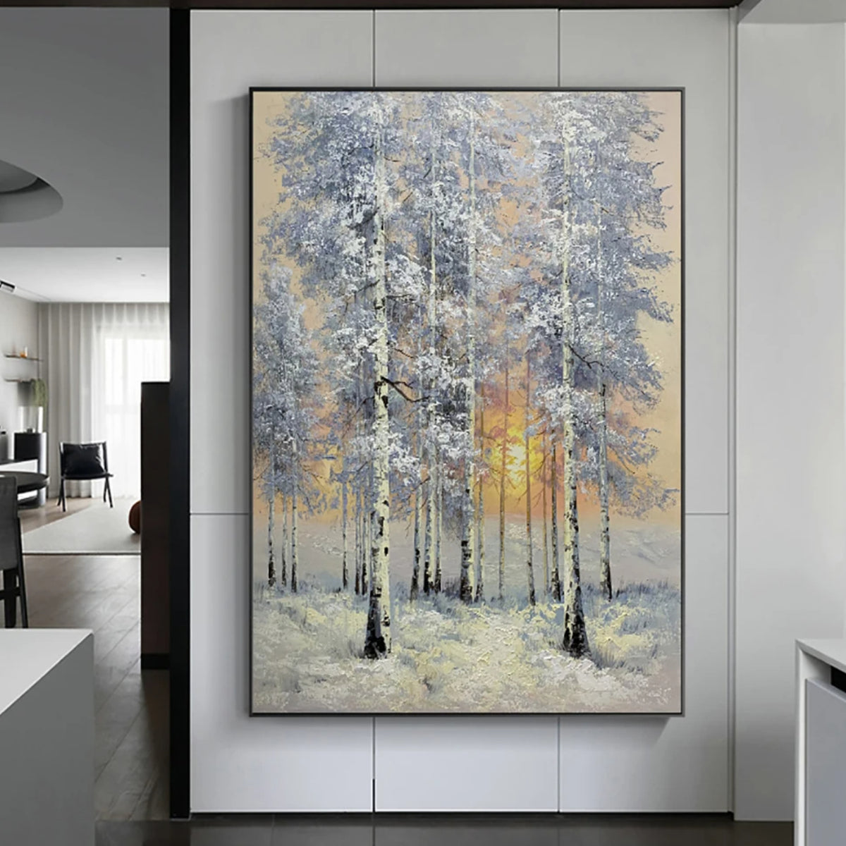 Room mockup showing snow-covered slender trees with white and blue-grey branches around a low golden sun.