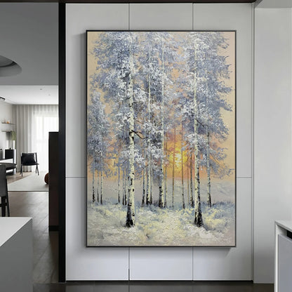 Room mockup showing snow-covered slender trees with white and blue-grey branches around a low golden sun.