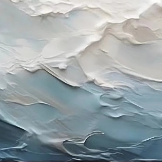 Close-up of sculpted white wave ridges over pale blue water.
