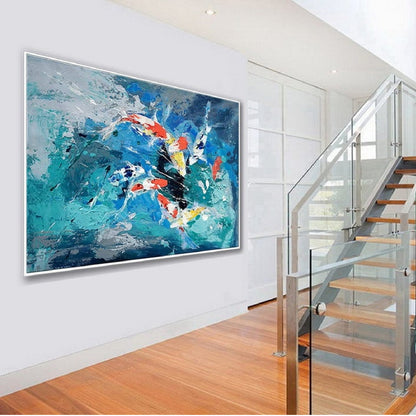 Room mockup. Energetic turquoise, blue and white strokes surround red, yellow and black accents across a horizontal abstract composition.