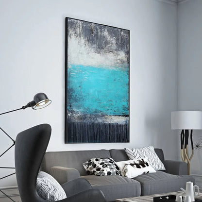 Room mockup. A bright turquoise central field lies between mottled grey upper marks and a dark lower band with fine drips.