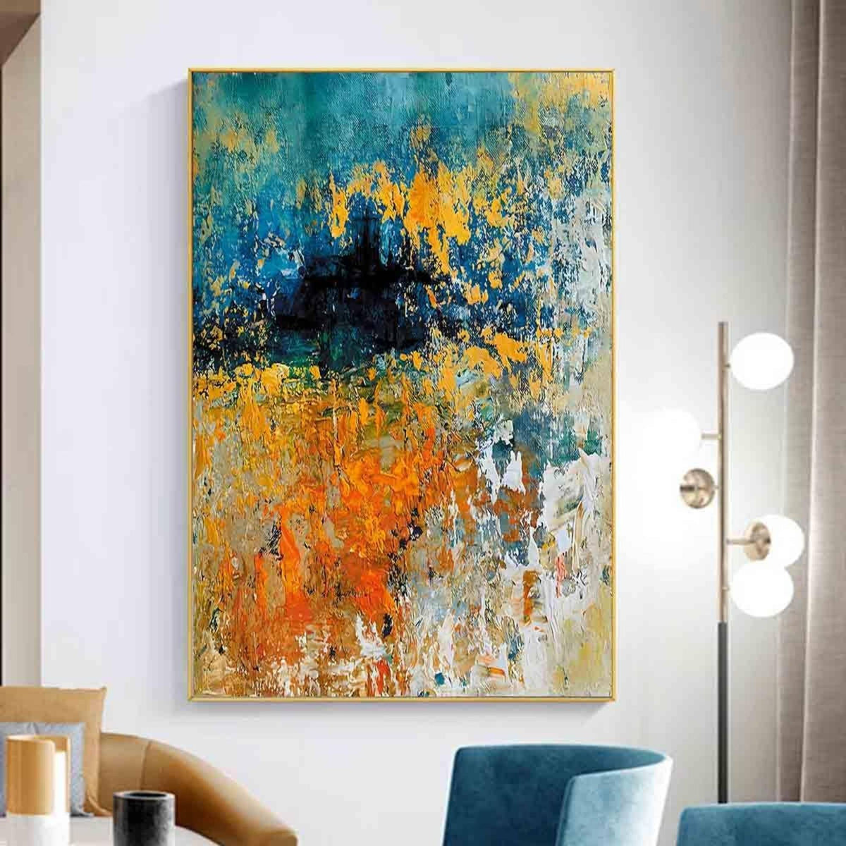 Room mockup showing textured turquoise, orange and yellow abstract painting with a dense dark navy patch and scattered white marks.