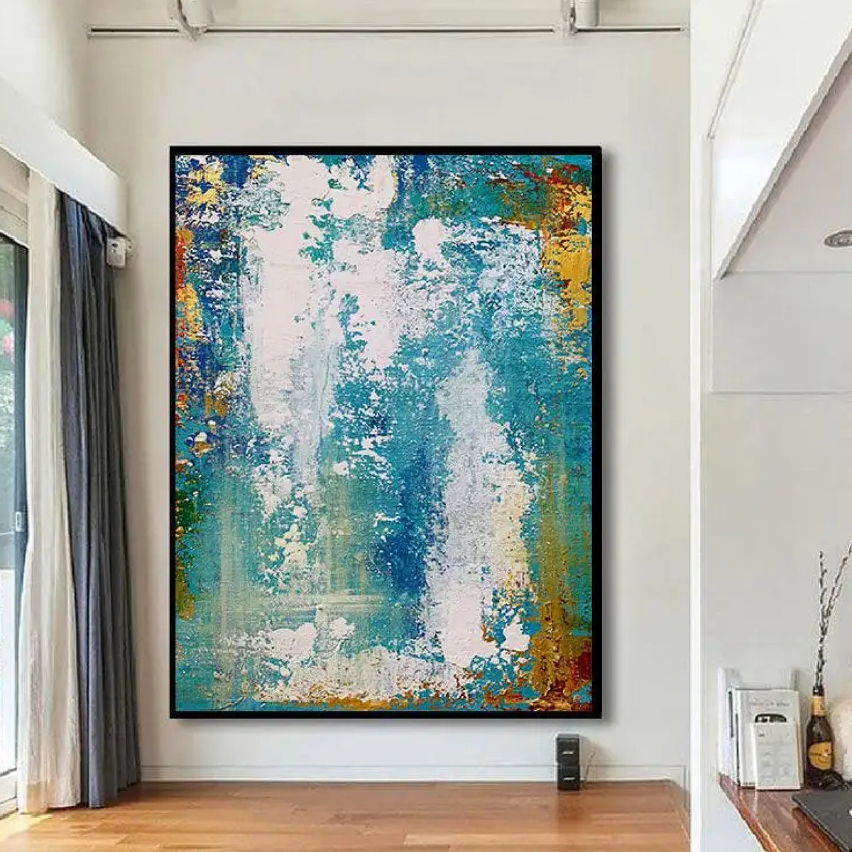 Room mockup. Scuffed white patches overlap turquoise and blue fields, with ochre and orange textured edges.