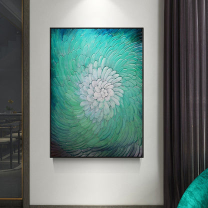 Room mockup. Raised petal-like strokes spiral from a white centre through mint and turquoise to dark teal edges.
