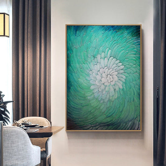 Room mockup. Raised petal-like strokes spiral from a white centre through mint and turquoise to dark teal edges.