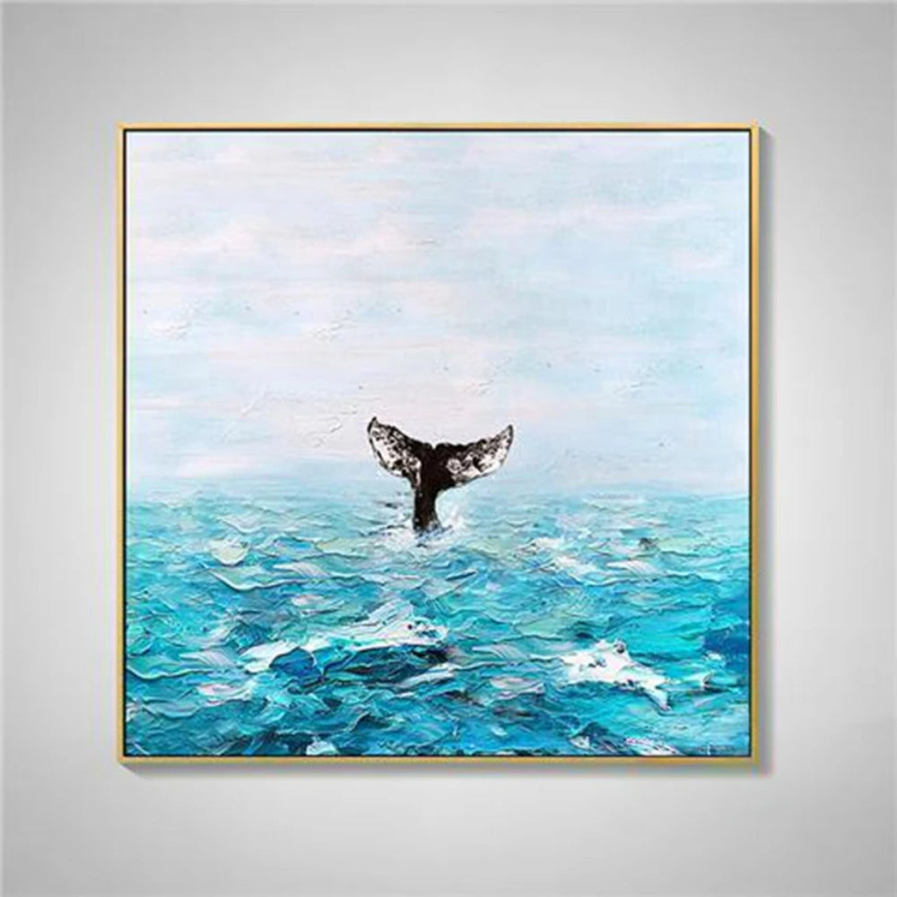 Dark whale tail rising above textured turquoise waves beneath a pale blue sky.