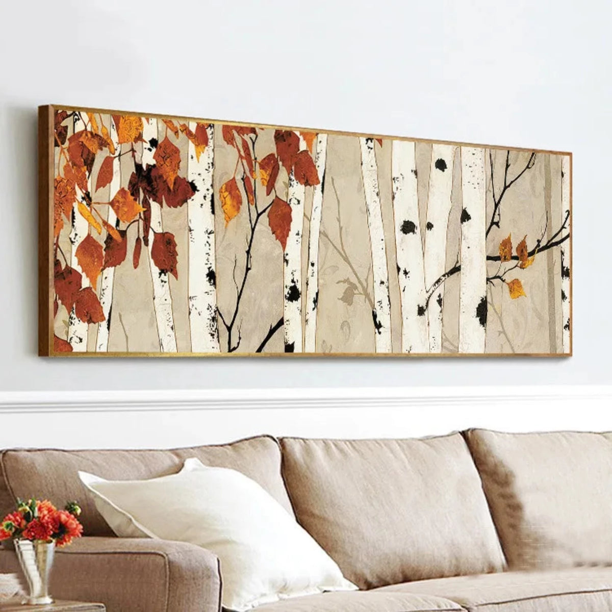Room mockup showing white birch trunks with black bark marks and sparse rust-orange leaves against a warm beige background.