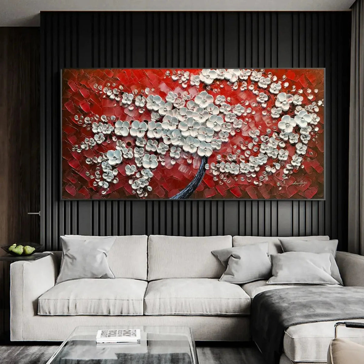 Room mockup showing dense white textured blossoms on a dark branching trunk against a bold red and burgundy background.