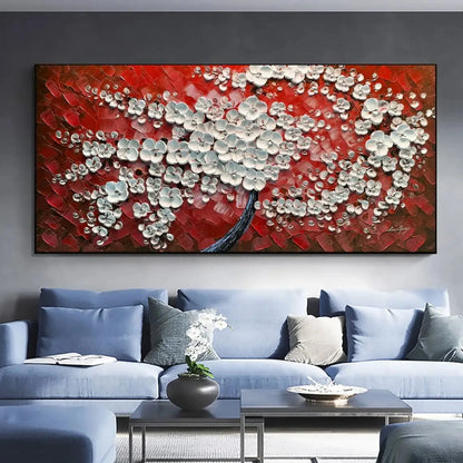 Room mockup showing dense white textured blossoms on a dark branching trunk against a bold red and burgundy background.