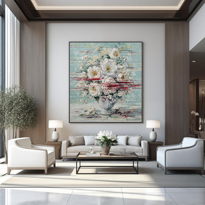 Hand-painted white floral textured abstract painting displayed in a warm modern luxury living room with soft lighting and neutral tones