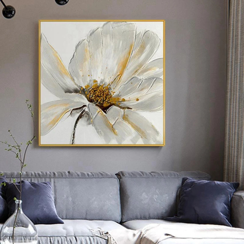 Room mockup showing large white flower with layered petals, fine grey outlines and a gold-coloured centre on a pale background.