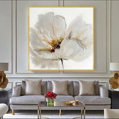 Room mockup showing large white flower with layered petals, fine grey outlines and a gold-coloured centre on a pale background.