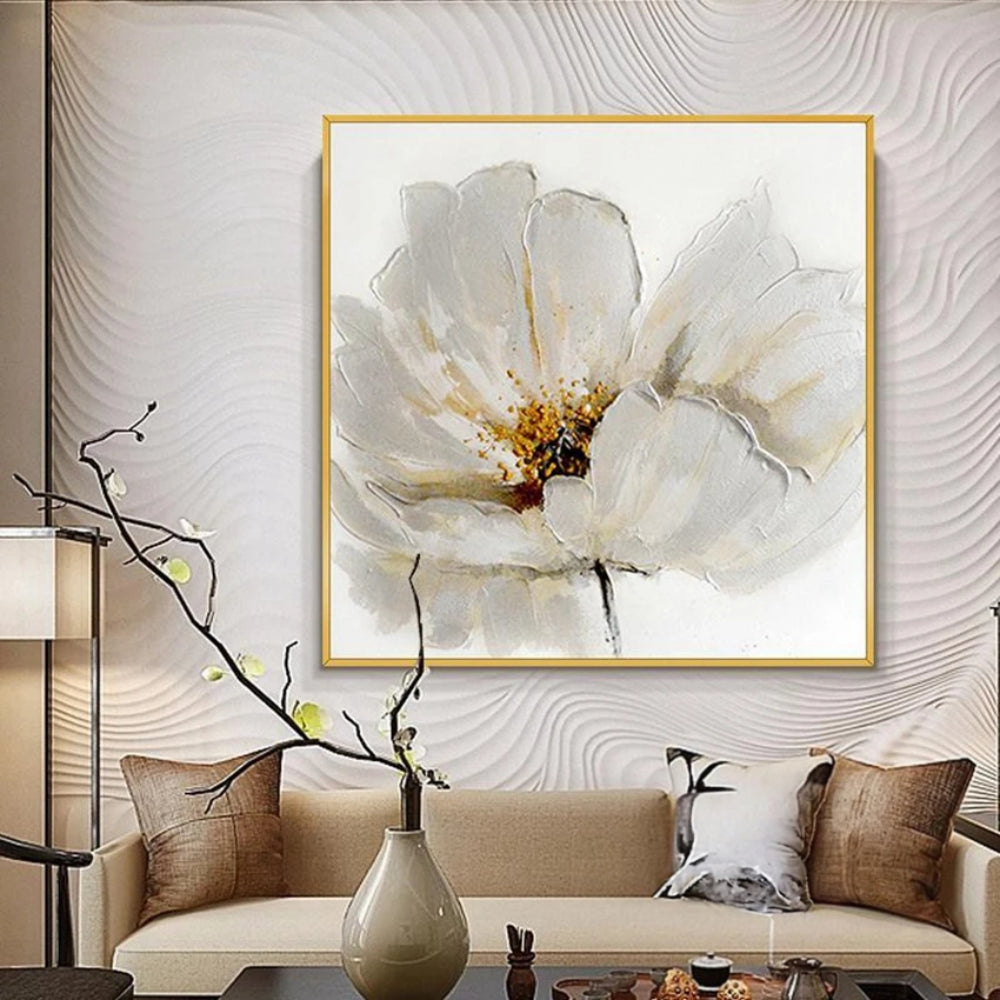 Room mockup showing large white flower with layered petals, fine grey outlines and a gold-coloured centre on a pale background.