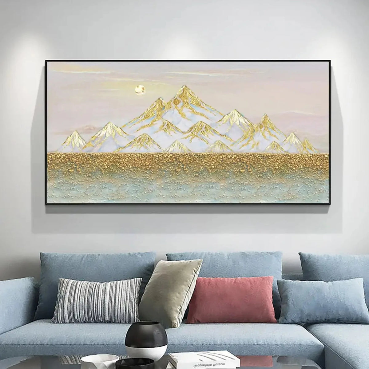 Room mockup showing white mountains edged with gold-coloured lines above a dense gold-coloured band and pale blue-grey foreground.