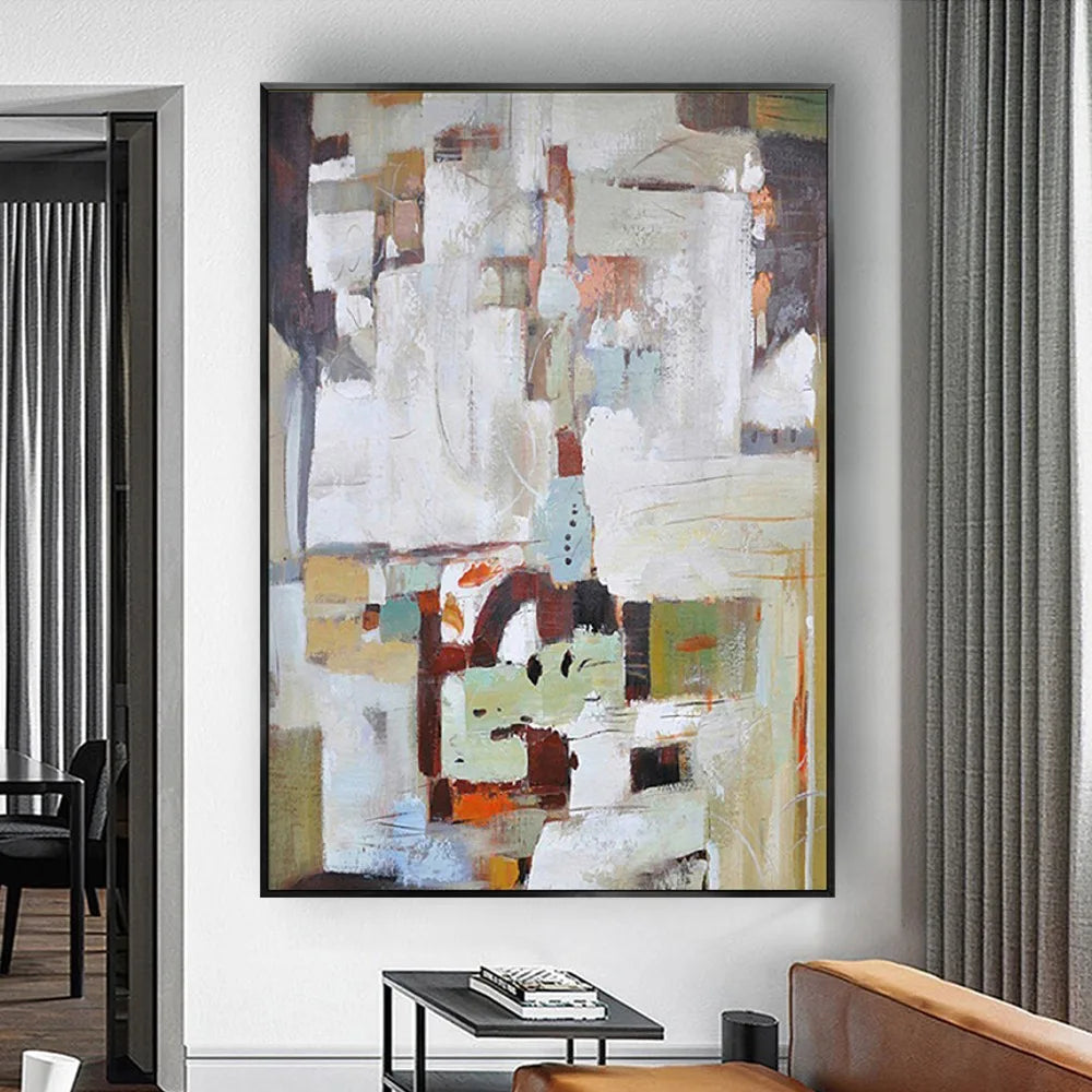 Room mockup showing white and grey abstract blocks above a cluster of brown, pale green, black and muted orange shapes.