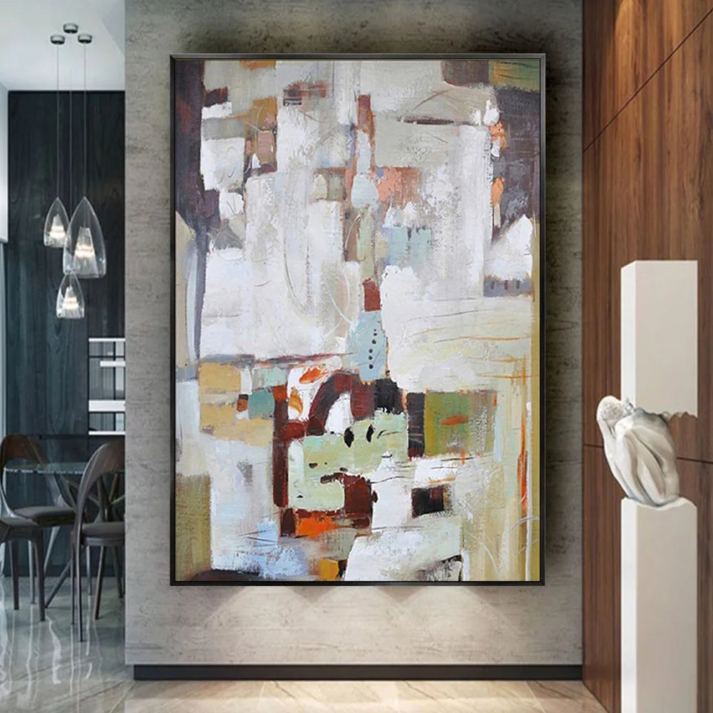 Room mockup showing white and grey abstract blocks above a cluster of brown, pale green, black and muted orange shapes.