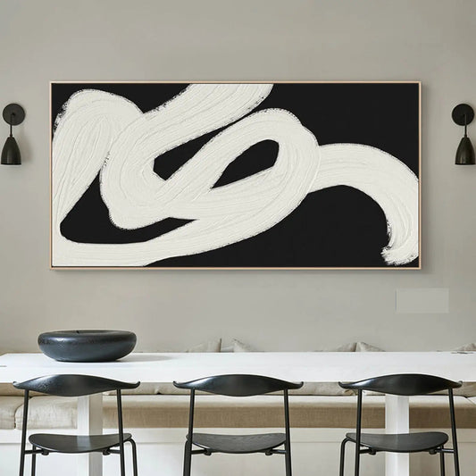 Room mockup. A broad white looping brushstroke sweeps across black, with visible ridges and feathered ends.