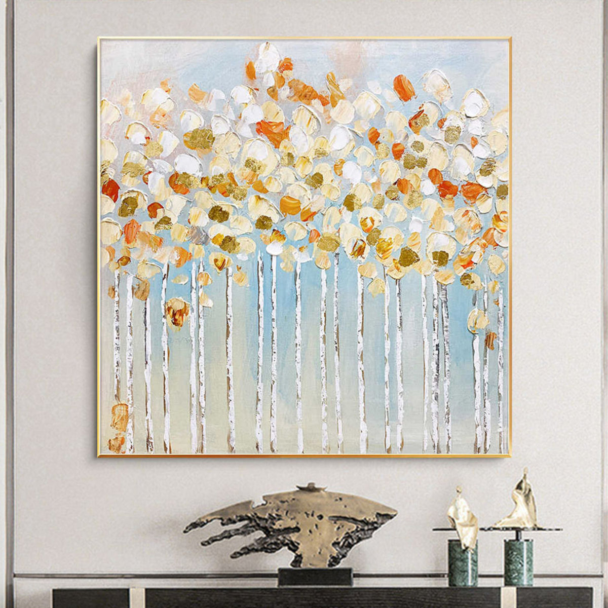 Room mockup. White and orange rounded blossom-like dabs crown fine pale trunks against a soft blue-grey background.