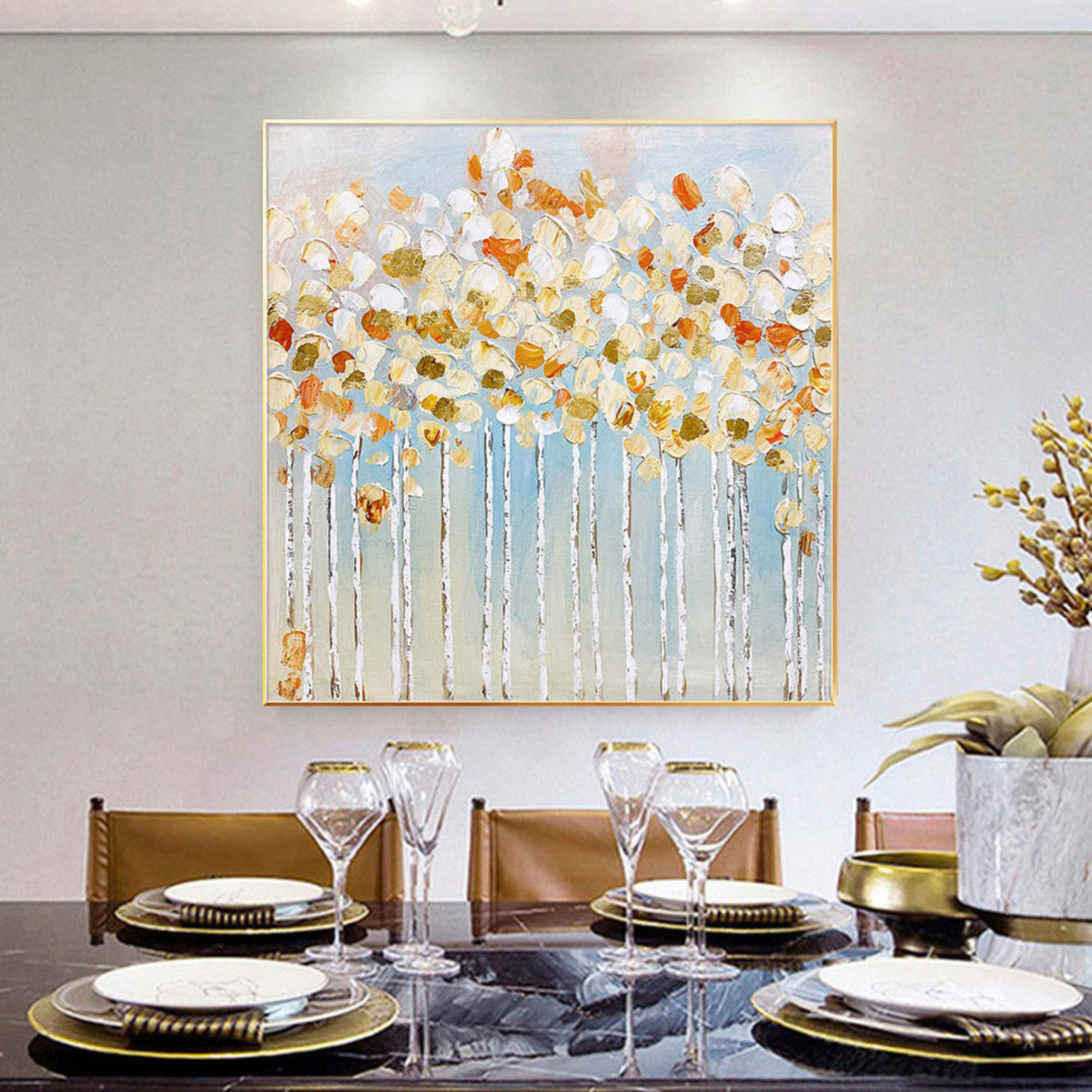 Room mockup. White and orange rounded blossom-like dabs crown fine pale trunks against a soft blue-grey background.