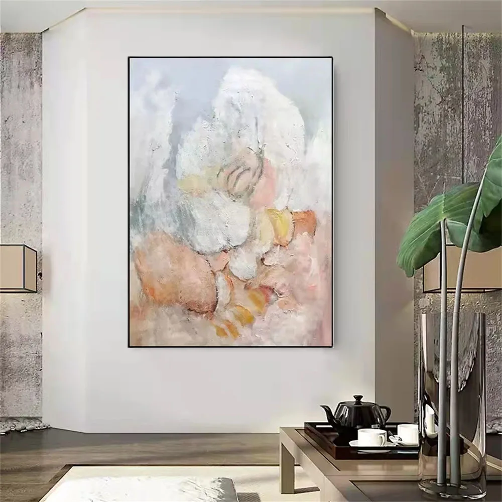 Room mockup showing pale abstract painting with rounded white forms, peach and pink areas, curved dark lines and yellow accents.