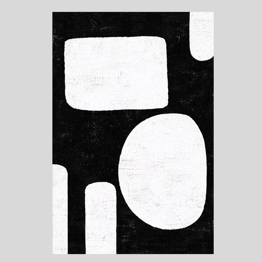 Rounded white rectangle, oval and short vertical shapes against a textured black background.