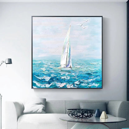 Room mockup showing tall white-sailed boat on textured turquoise waves beneath a pale blue sky with small white birds.