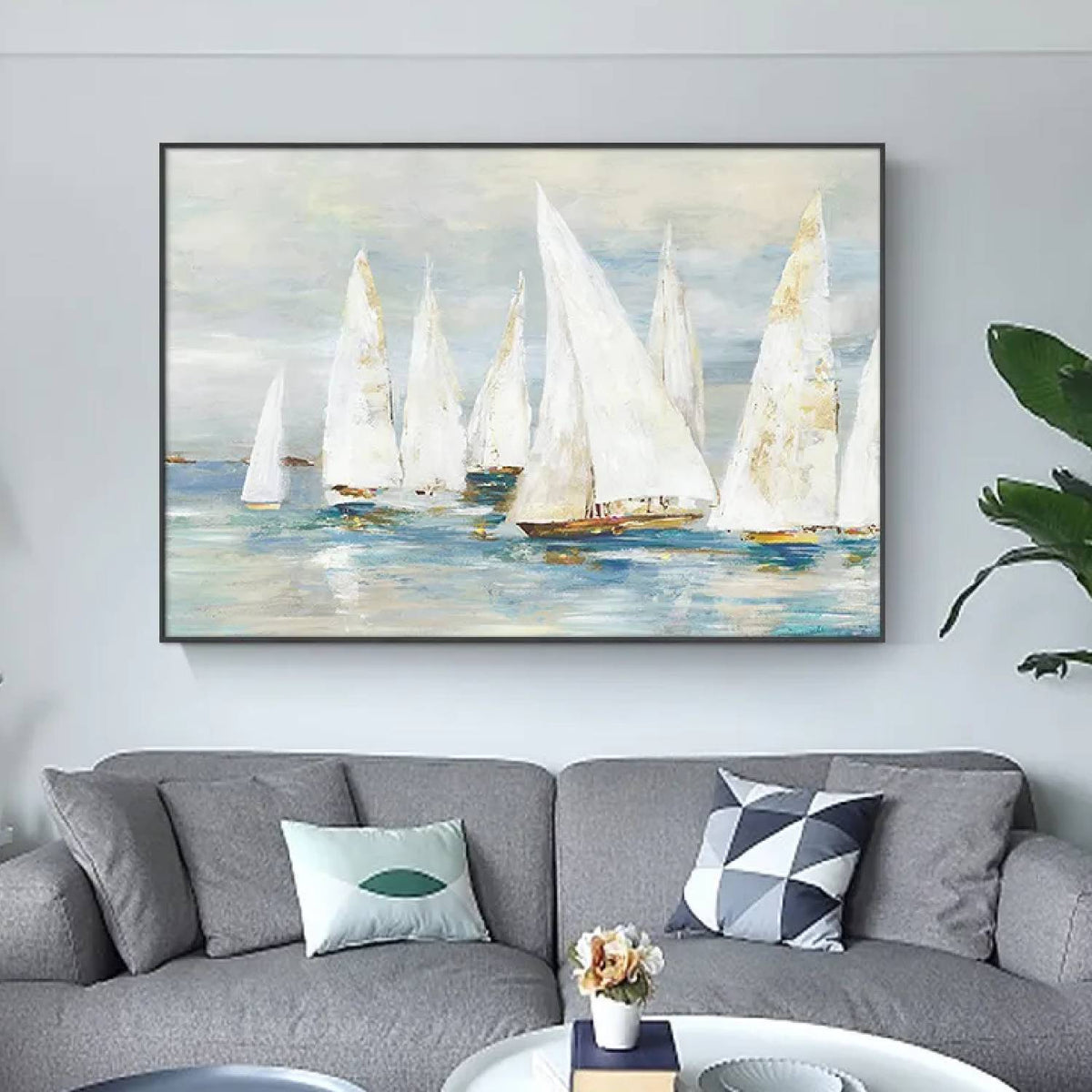 Room mockup. White-sailed boats with small ochre hulls across soft blue-grey water beneath a pale grey sky.