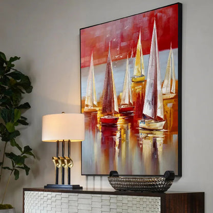 Room mockup. Tall white and yellow sails above red and ochre hulls, with long reflections beneath a red and pale grey sky.