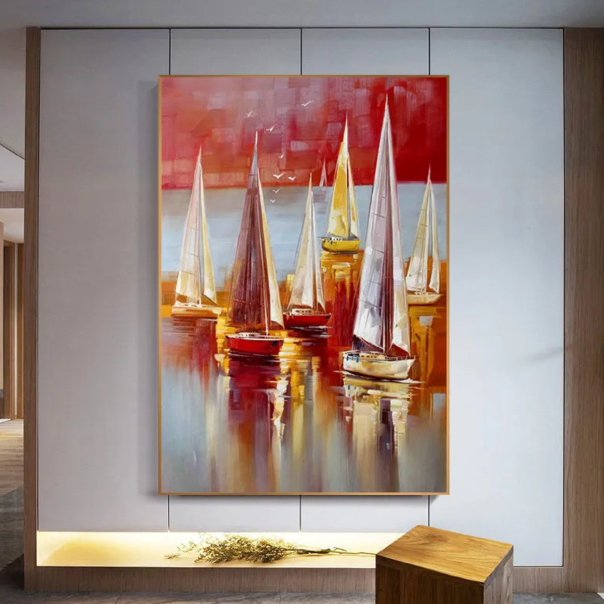 Room mockup. Tall white and yellow sails above red and ochre hulls, with long reflections beneath a red and pale grey sky.