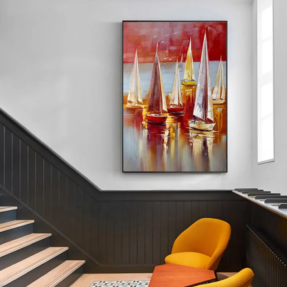 Room mockup. Tall white and yellow sails above red and ochre hulls, with long reflections beneath a red and pale grey sky.
