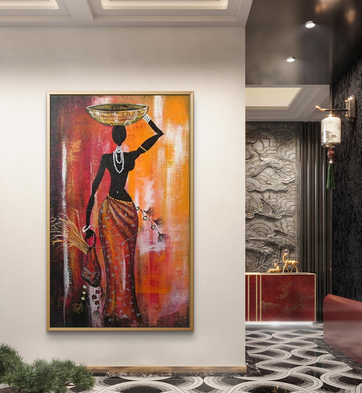Room mockup. Dark silhouetted woman in a red-orange skirt, balancing a gold-coloured bowl against a red and orange background.
