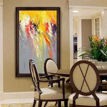 Room mockup. Bright yellow upper strokes blend into grey below, with pink, white and black accents trailing downward.