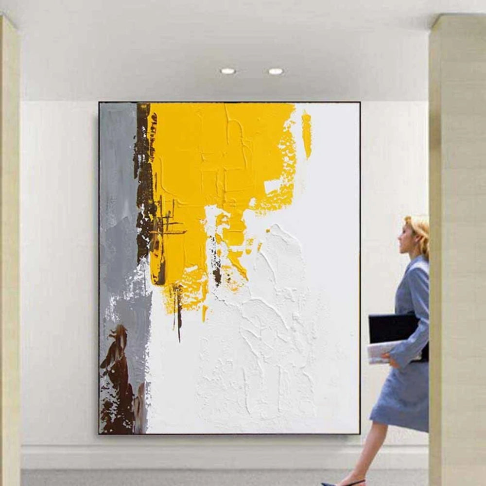 Room mockup showing textured white abstract with a large mustard yellow upper block and narrow grey and brown marks along the left.