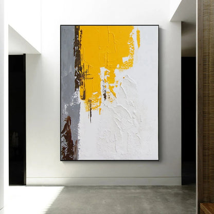 Room mockup showing textured white abstract with a large mustard yellow upper block and narrow grey and brown marks along the left.