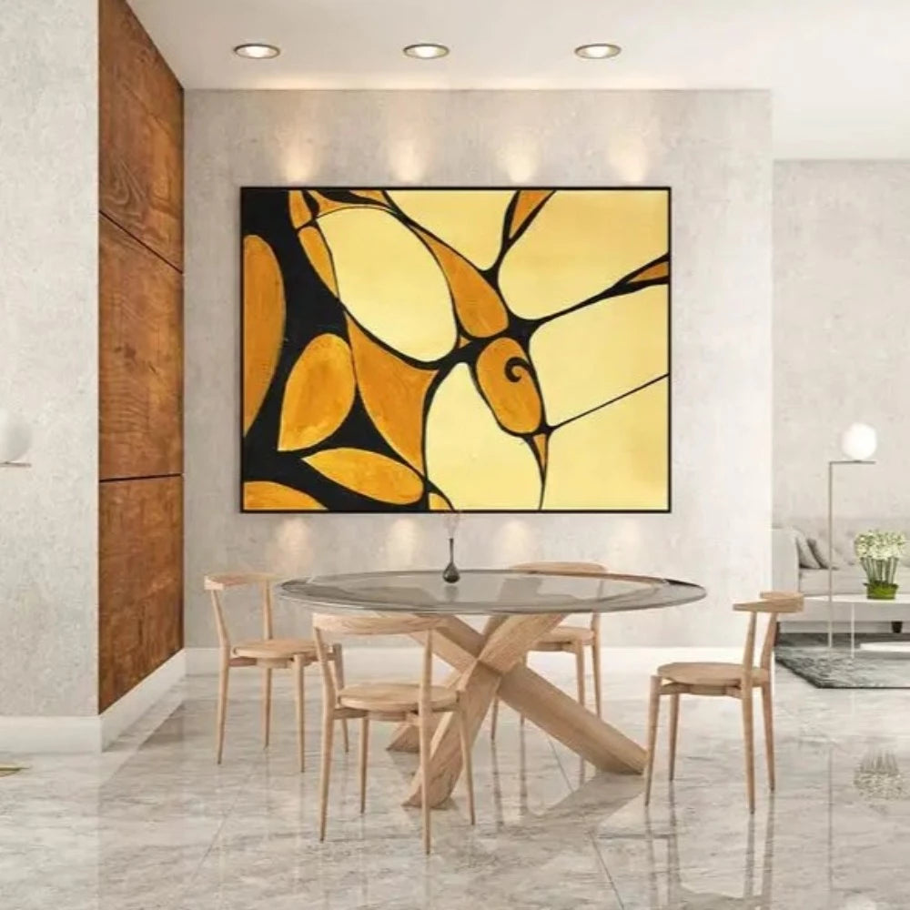 Room mockup showing curved yellow and ochre shapes divided by bold black lines with a small spiral motif.