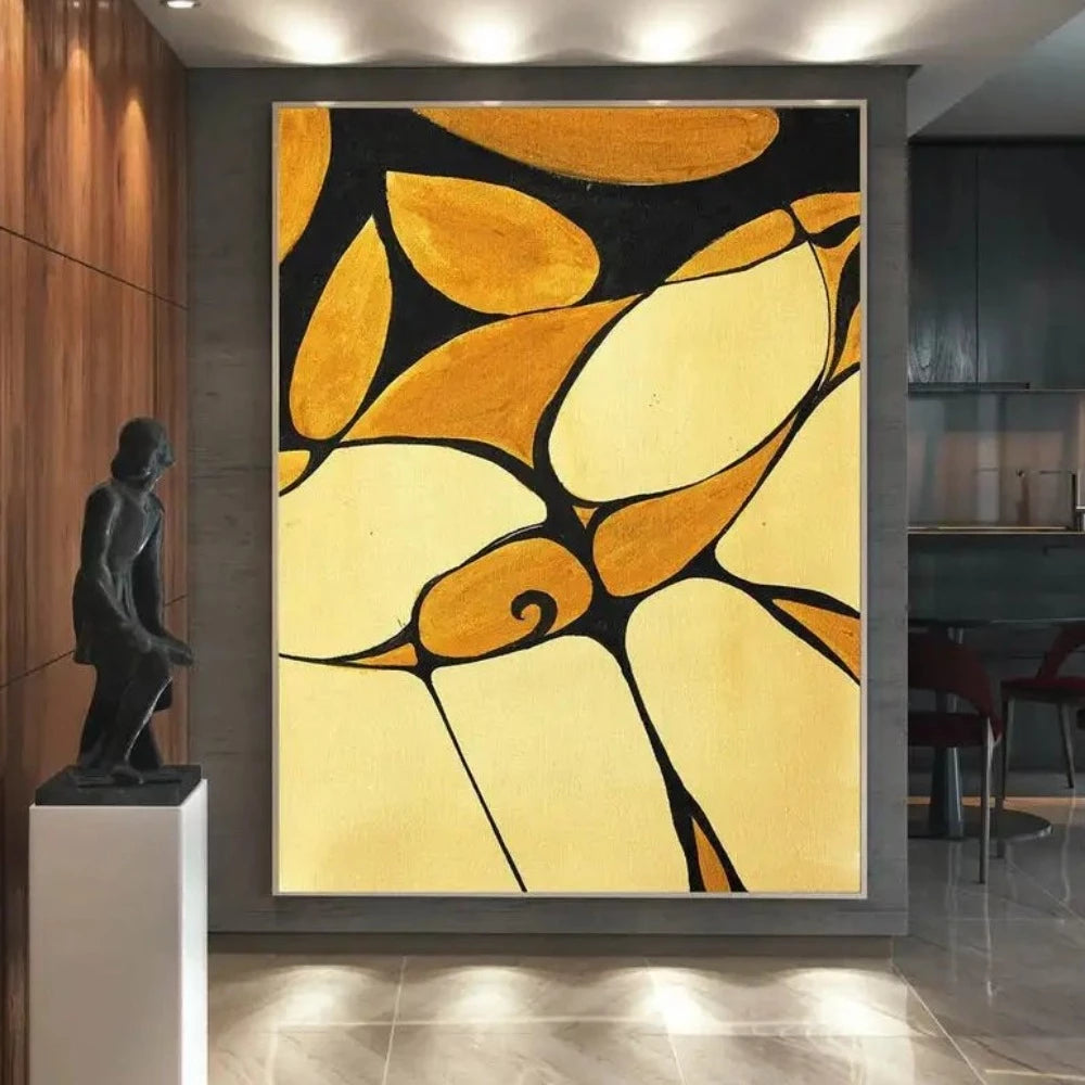 Room mockup showing curved yellow and ochre shapes divided by bold black lines with a small spiral motif.