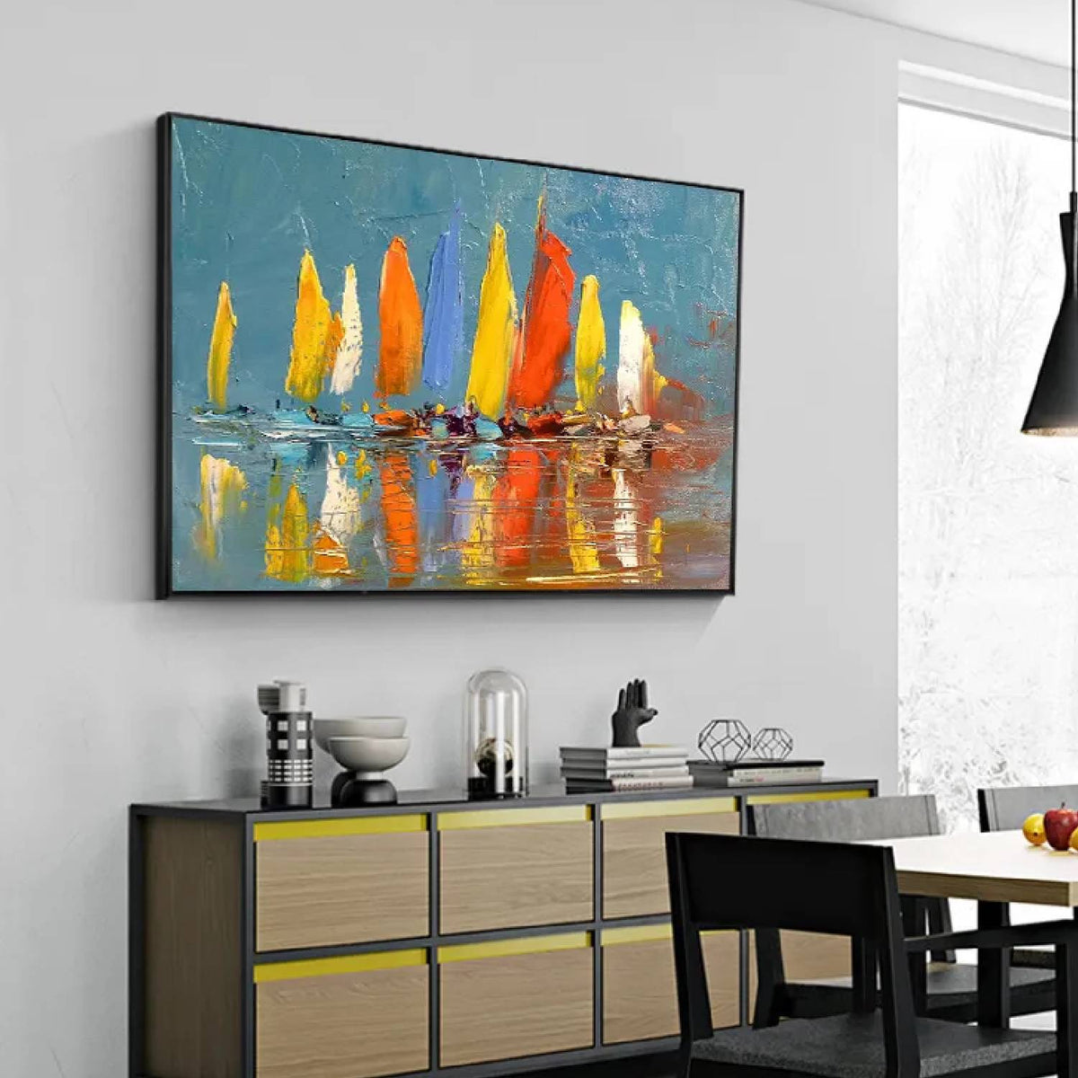 Room mockup. A row of boats with bright yellow, orange and white sails reflected in muted blue-grey water.