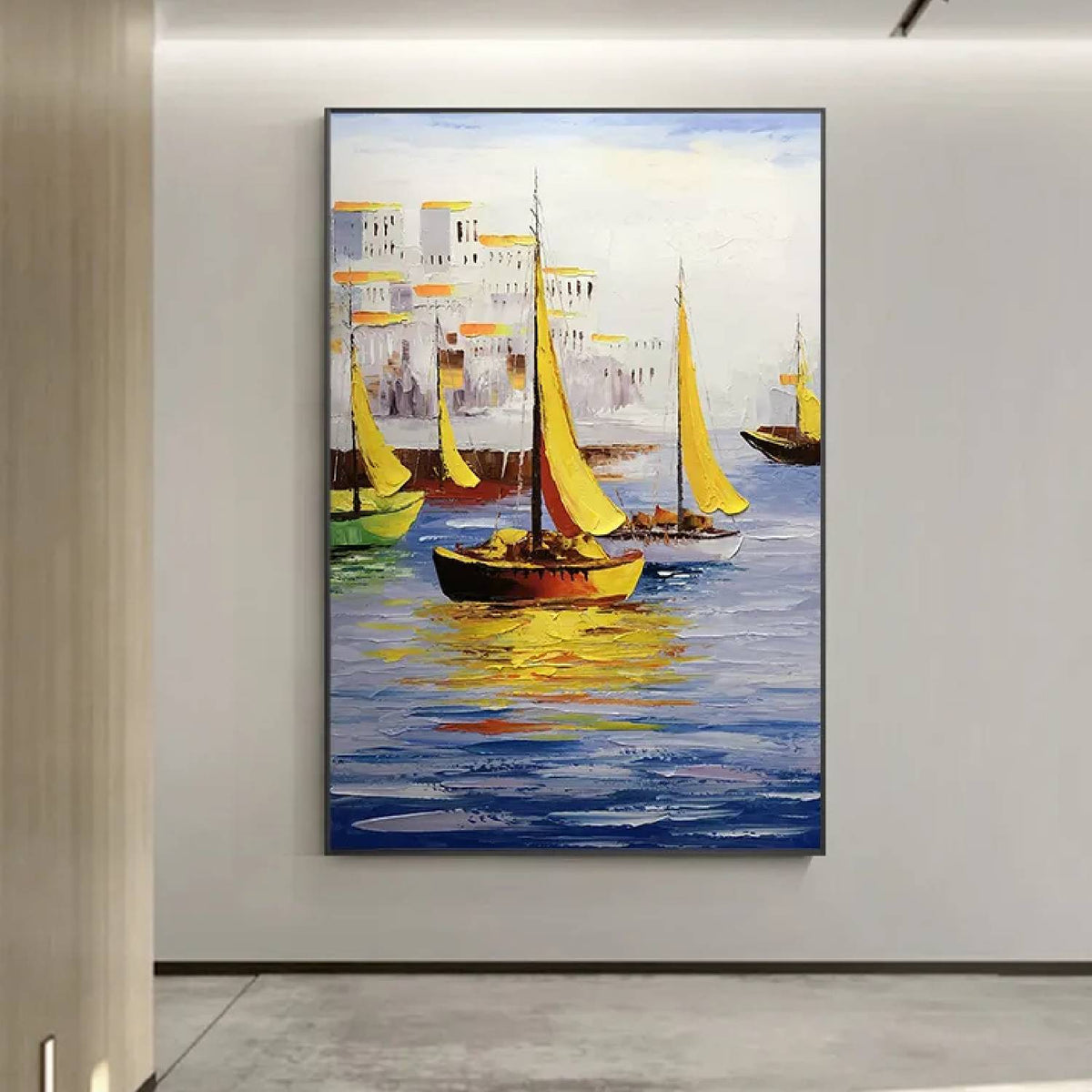 Room mockup. Yellow sails and dark boat hulls reflected in blue water beside pale waterfront buildings with warm yellow accents.