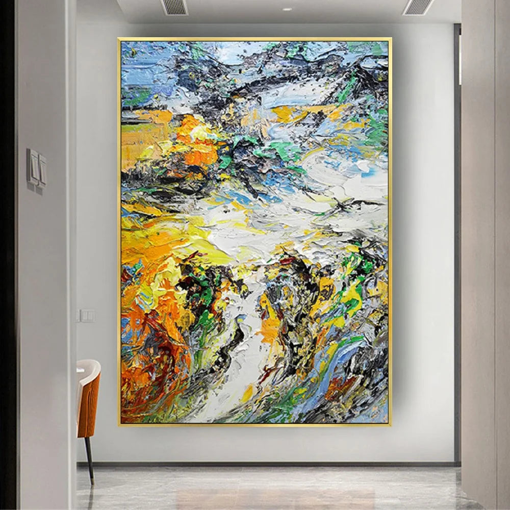 Room mockup showing dense expressive yellow, white, dark grey and green strokes with small orange and blue accents.